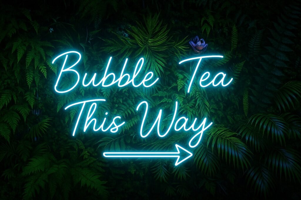 a neon sign saying bubble tea this way
